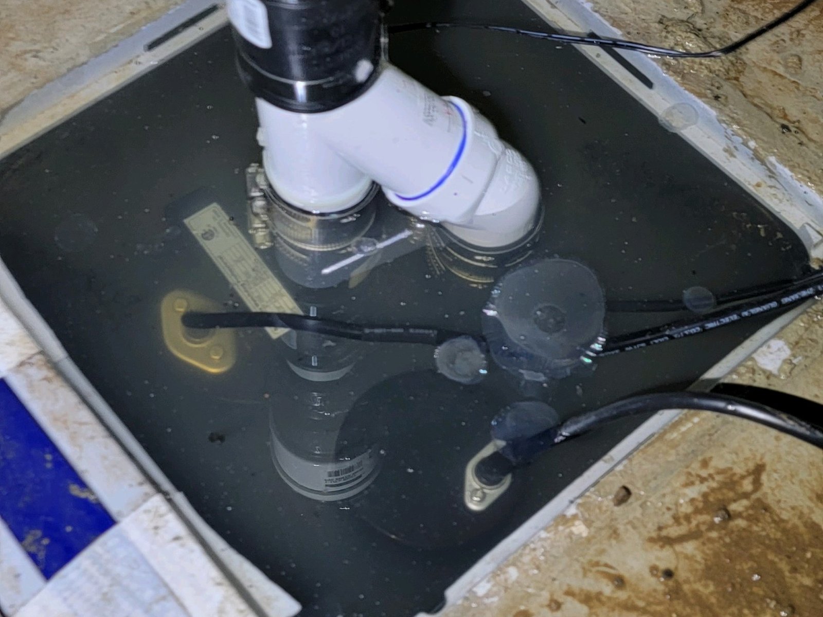 Anajur sump pump basin check valve and discharge piping under NYC Plumbing Code Section 1113 on Staten Island